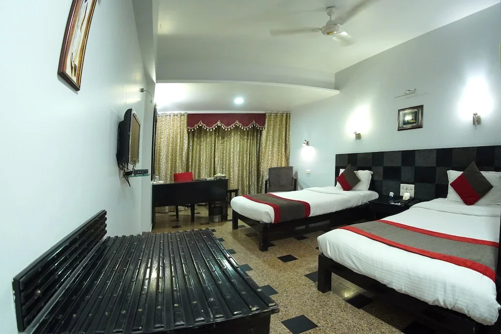 Hotel Venkatesh International - Chambres