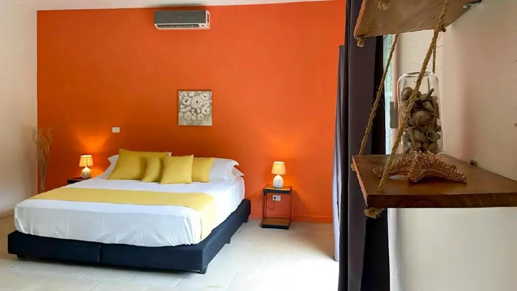 Standard Triple room with garden view