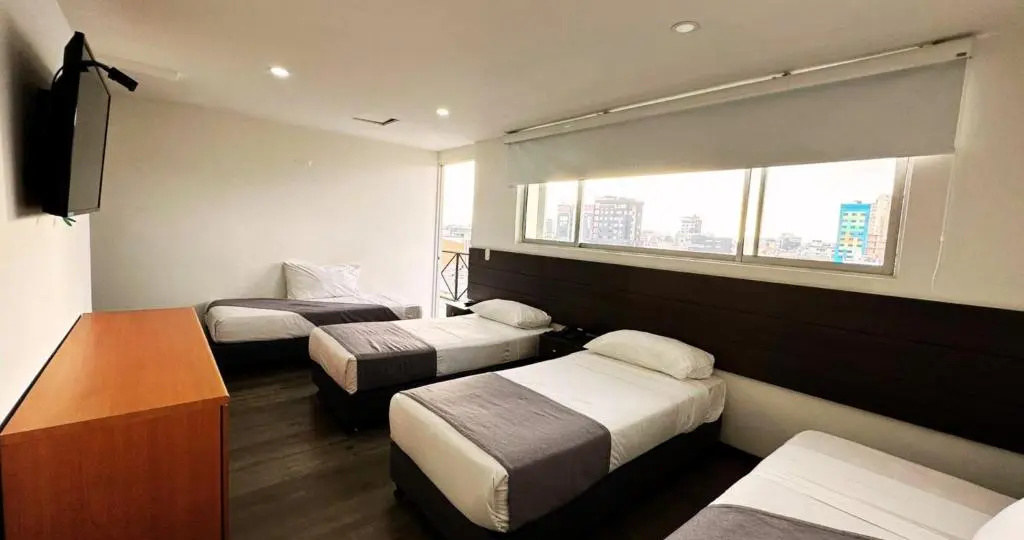 Expo Hotel Ferial - Chambres