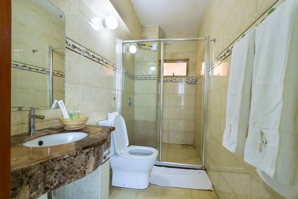 The Legacy Hotel & Suites - Chambres