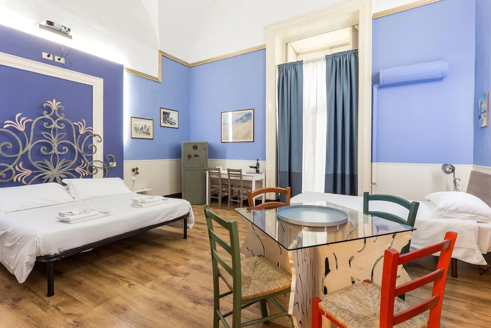 Standard Triple room with balcony and with city view