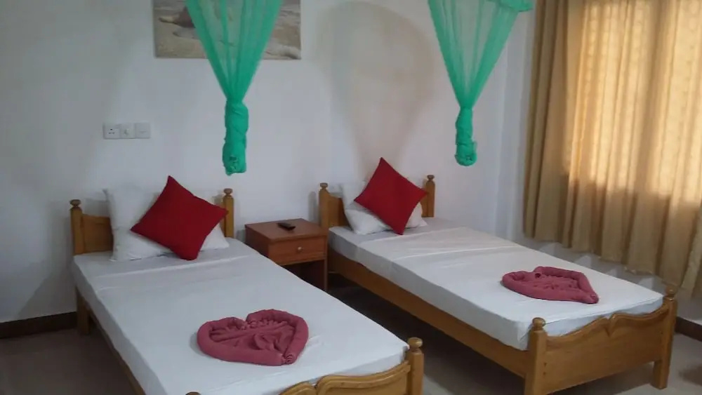 Oasis Beach Resort - Chambres