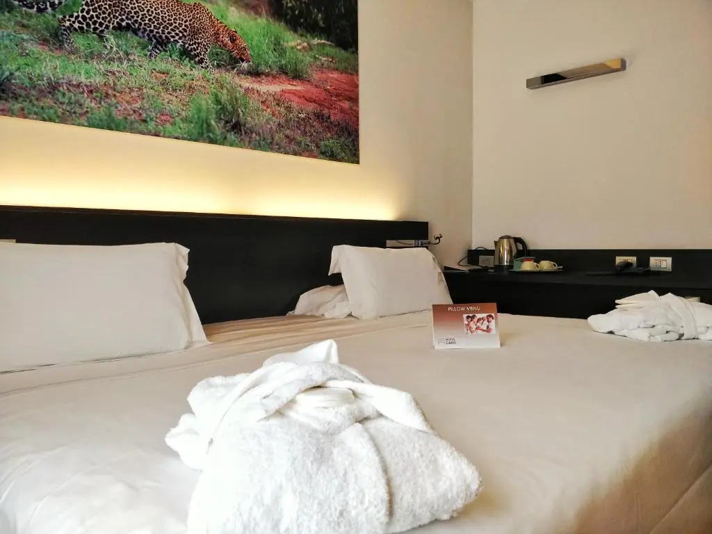Card International Hotel - Chambres