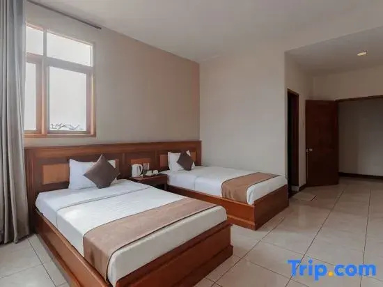 Surya Kencana Seaside Hotel - Chambres