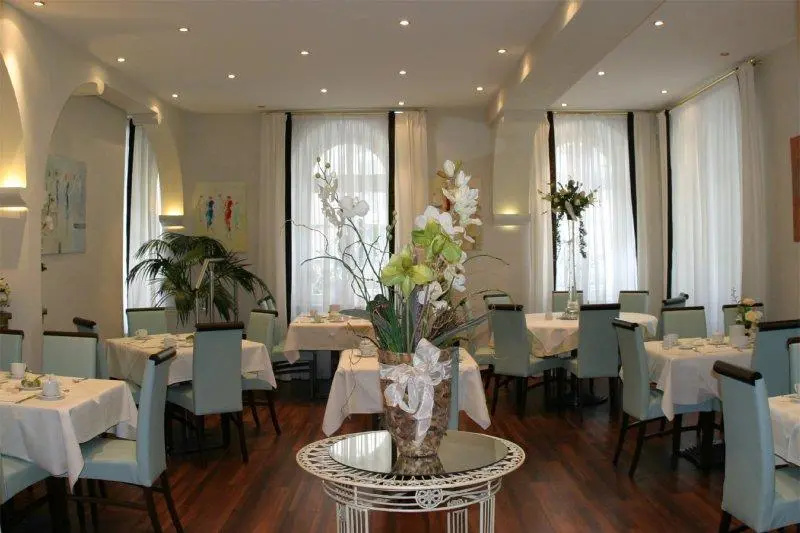 Hotel Merkur - Chambres
