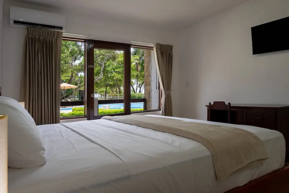 Fuego del Sol Beachfront Hotel - Chambres
