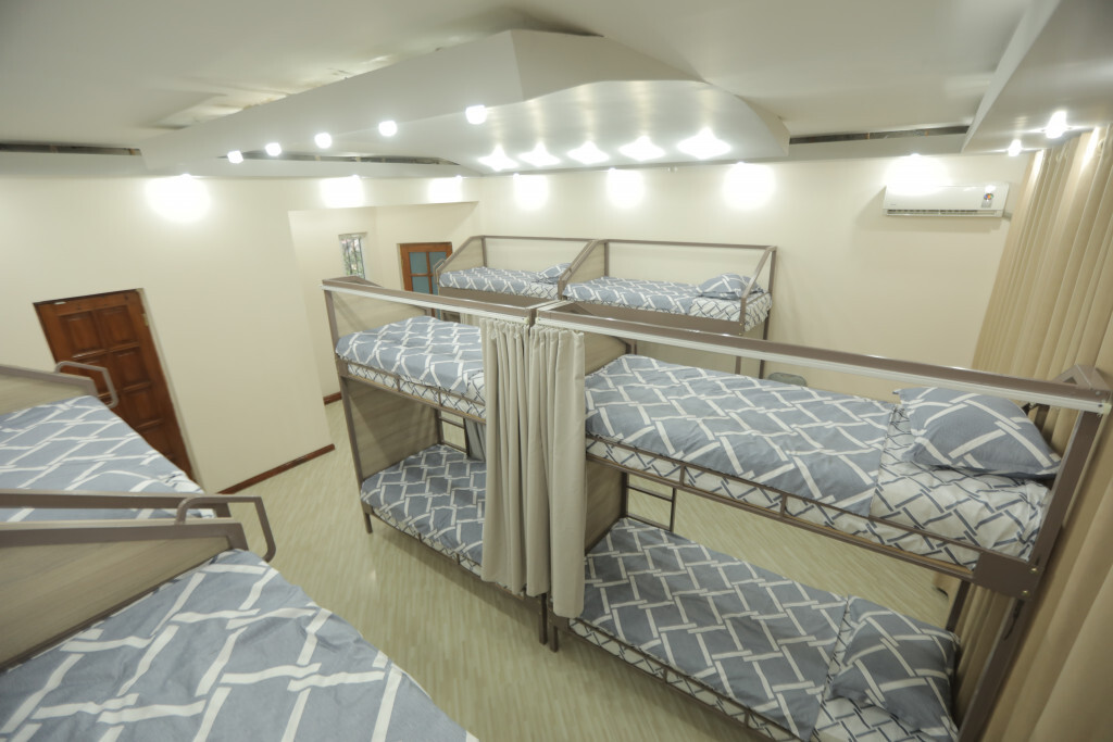 Кровать в общем номере в The Top Hostel