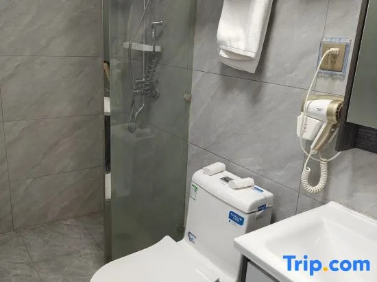 Xinxiang Hotel - Chambres