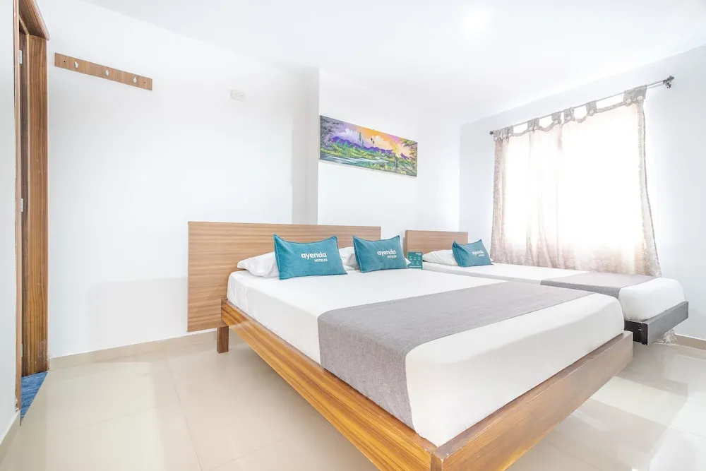 Hotel Metropolitana Plaza - Chambres