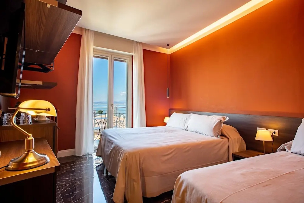 Superior Triple room with balcony and with lake view