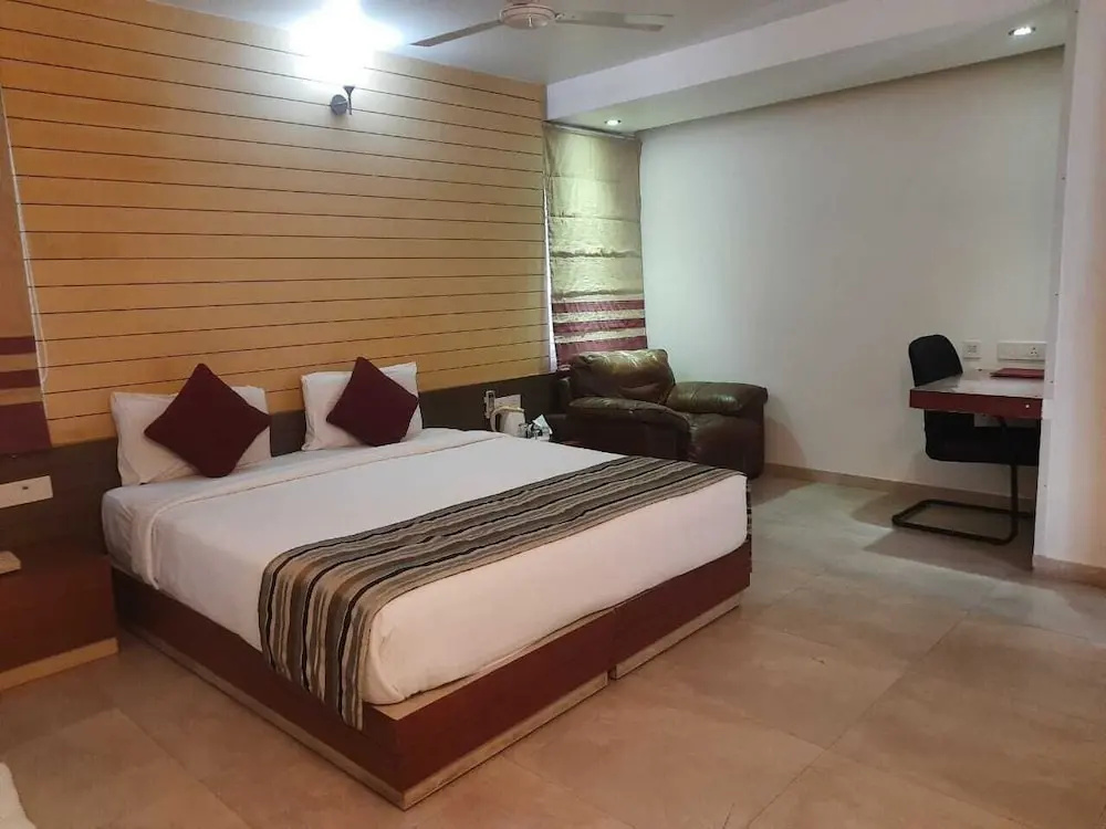 Roseline Suites - A Business Hotel - Chambres