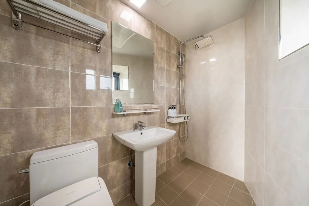 Sunrise Hotel Jungmun - Chambres