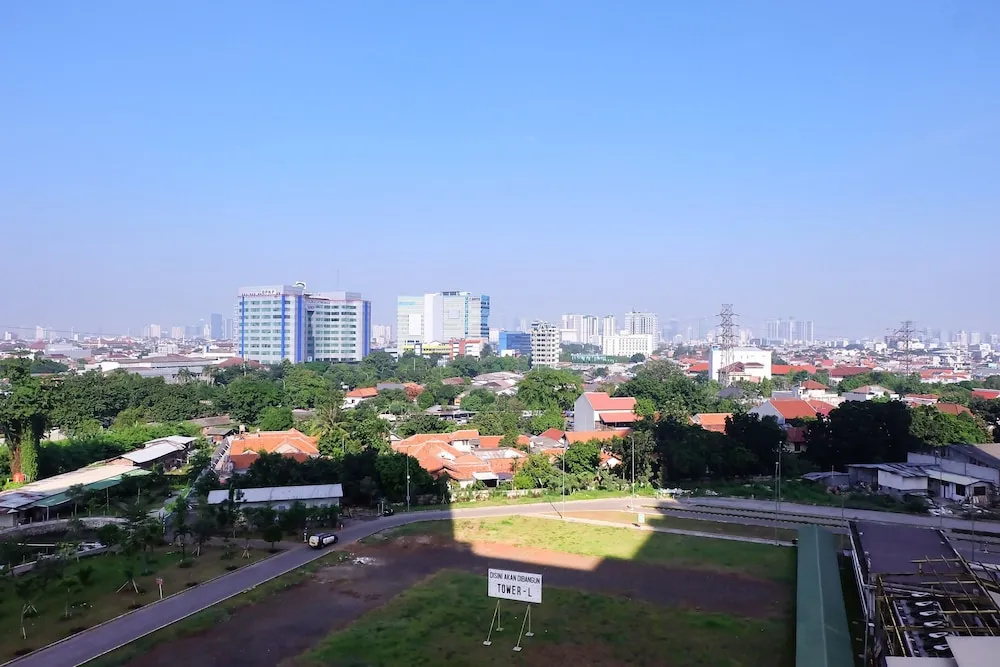 Tranquil 2BR @ Green Pramuka Apartment
