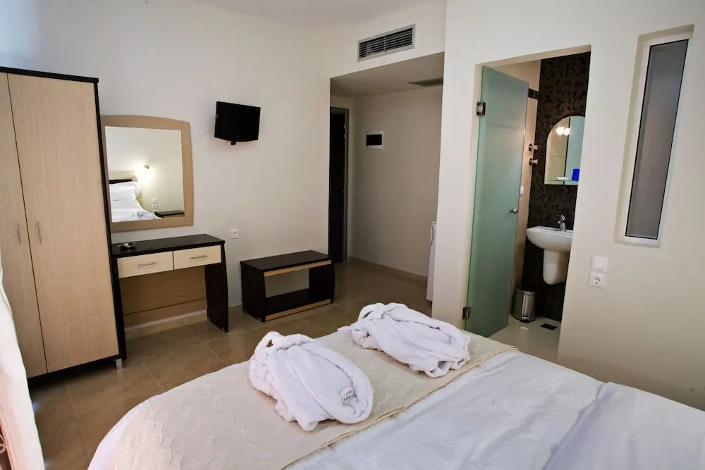 RG Status Hotel - Chambres