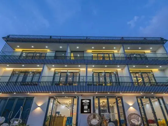 Floral Hotel Dali Shuanglang Yuanjuyishu Seaview