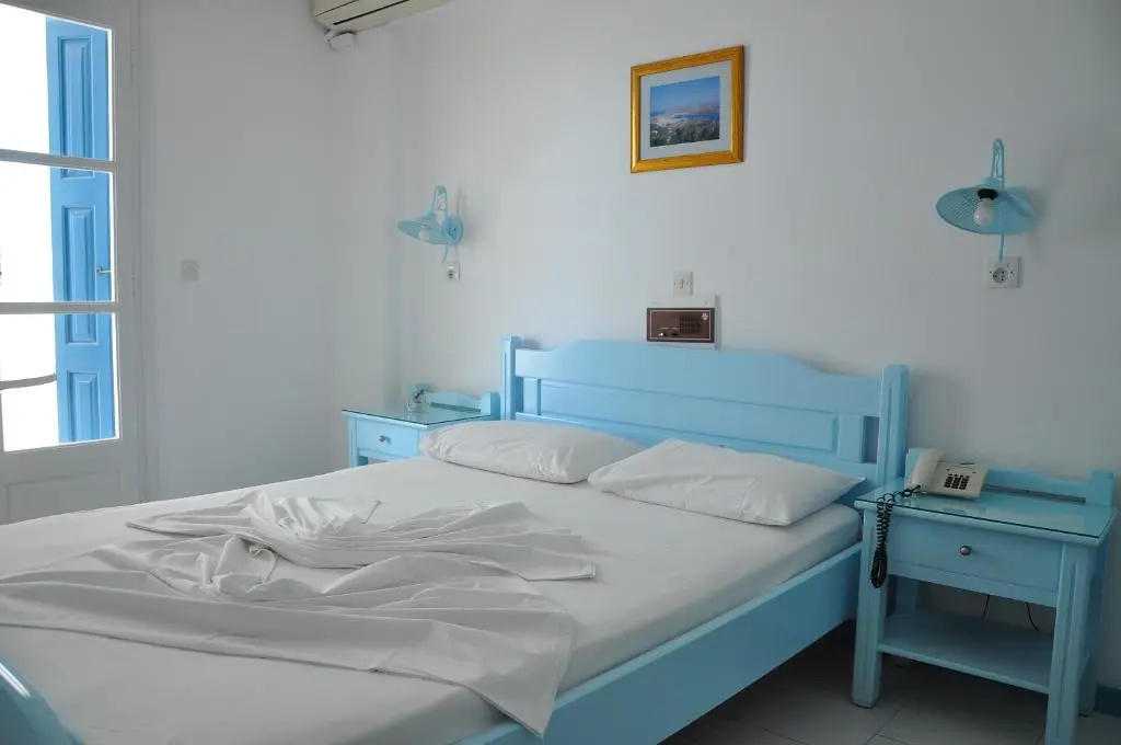 Remezzo Hotel & Studios - Chambres