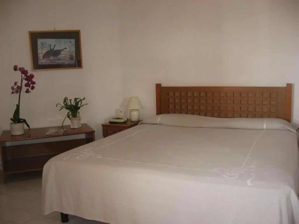 Standard Triple room with garden view