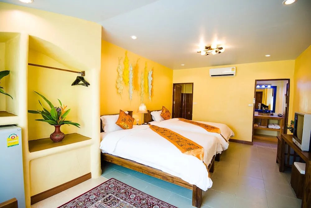 E-outfitting Pai Resort - Chambres