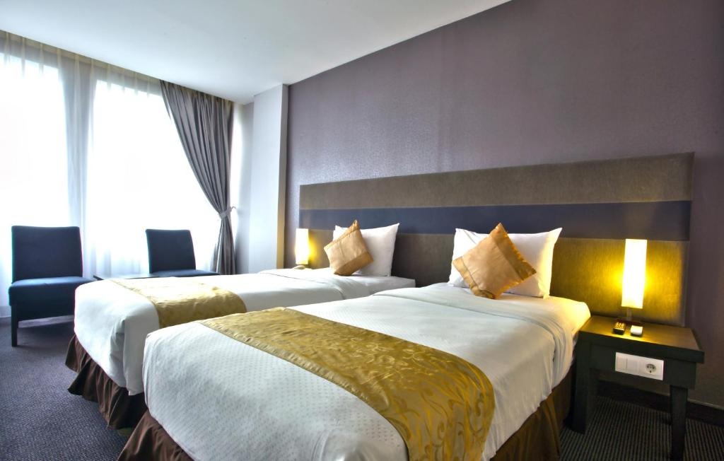Tjokro Hotel Pekanbaru Room Type - Deluxe Double Room