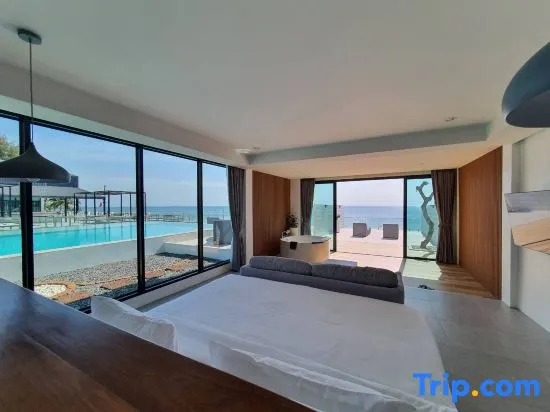 Люкс Deluxe oceanfront в Rattana Pura Beach Resort