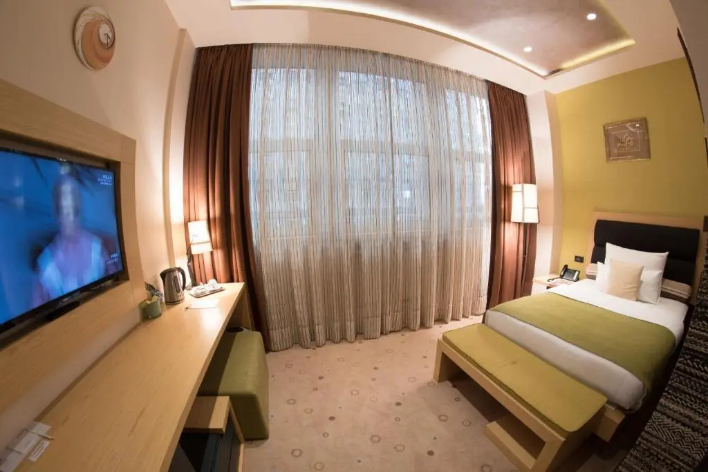 Atera Business Suites - Chambres
