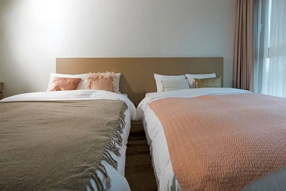 Artstay Hamdeok Beach Hotel - Chambres