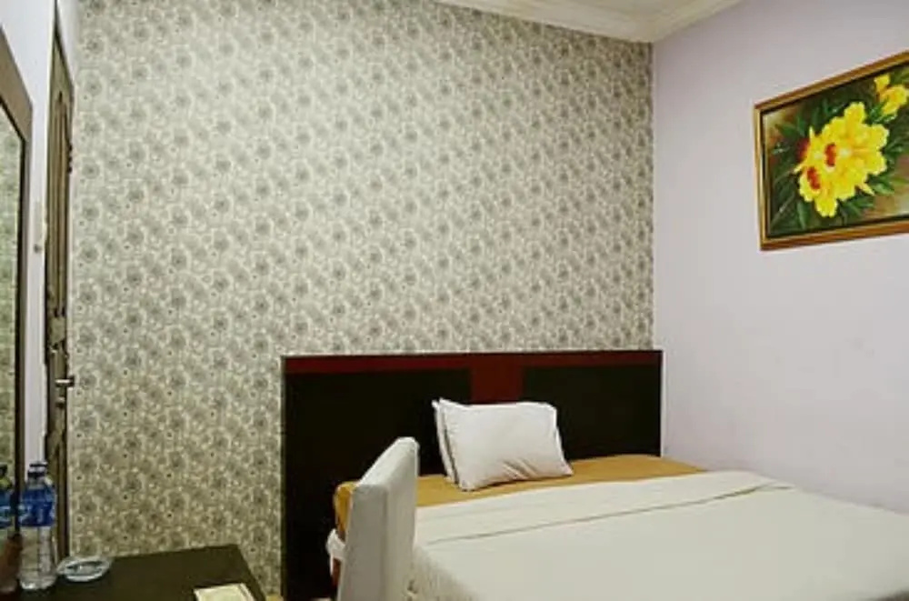 Griya Hotel - Chambres