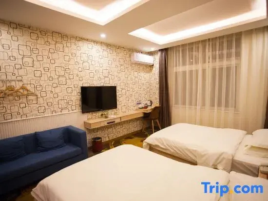 Huatian Hotel - Chambres