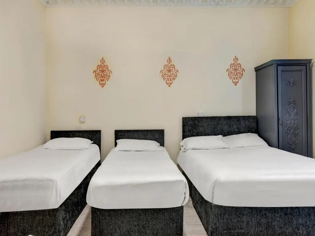 Empire Hotel - Chambres