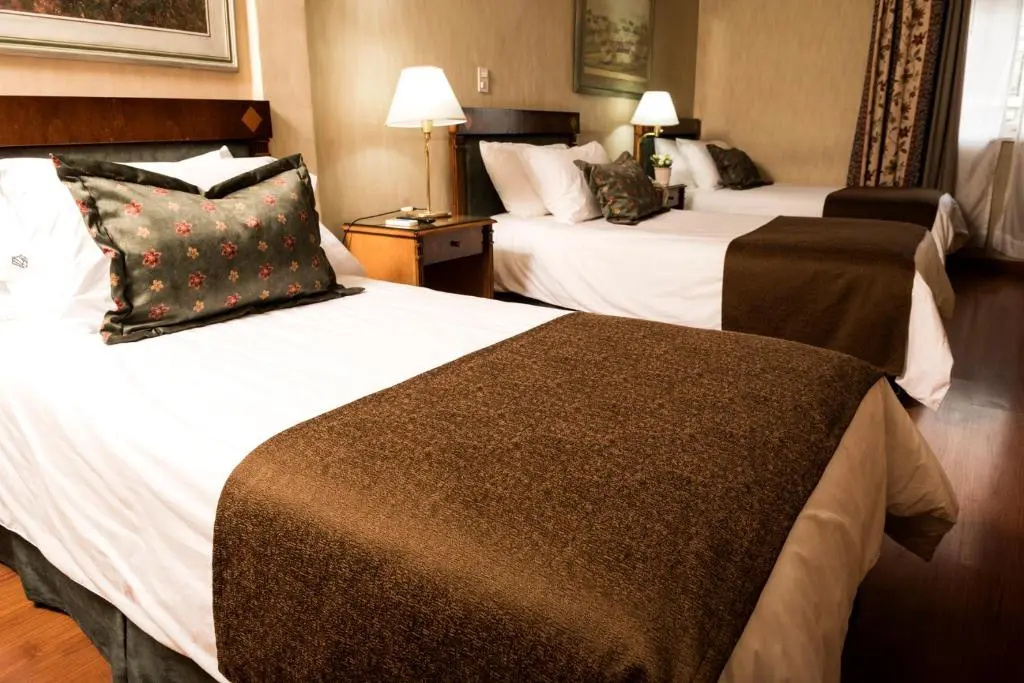 Mayflower Suites - Chambres