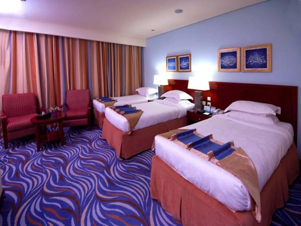 Dar Al Eiman Royal Hotel - Chambres