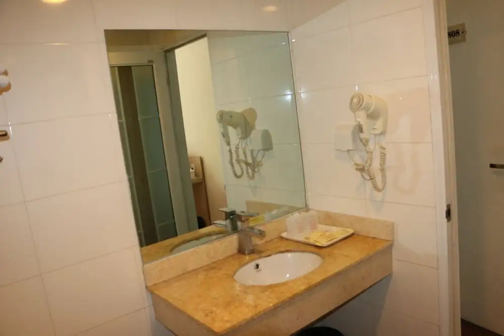 Yixin Business Hotel - Chambres