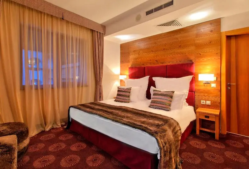 Kempinski Hotel Grand Arena - Chambres