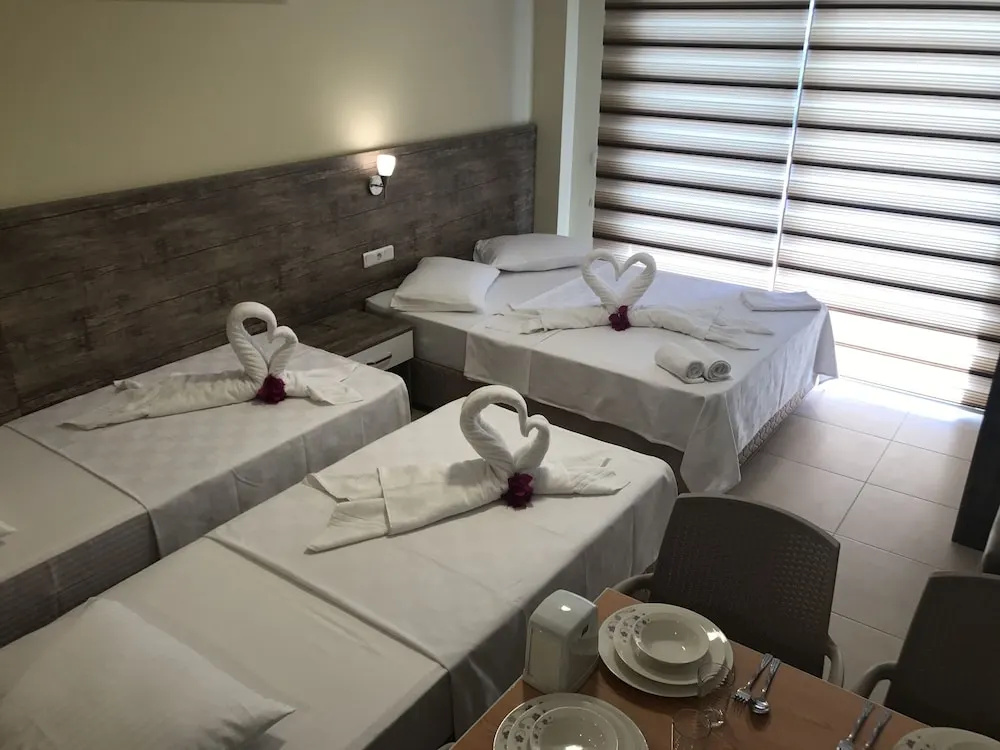 Deluxe Quadruple room with balcony