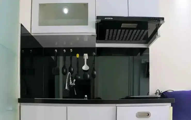 Modern 2BR Apartment Green Pramuka City near Shopping Center By Travelio