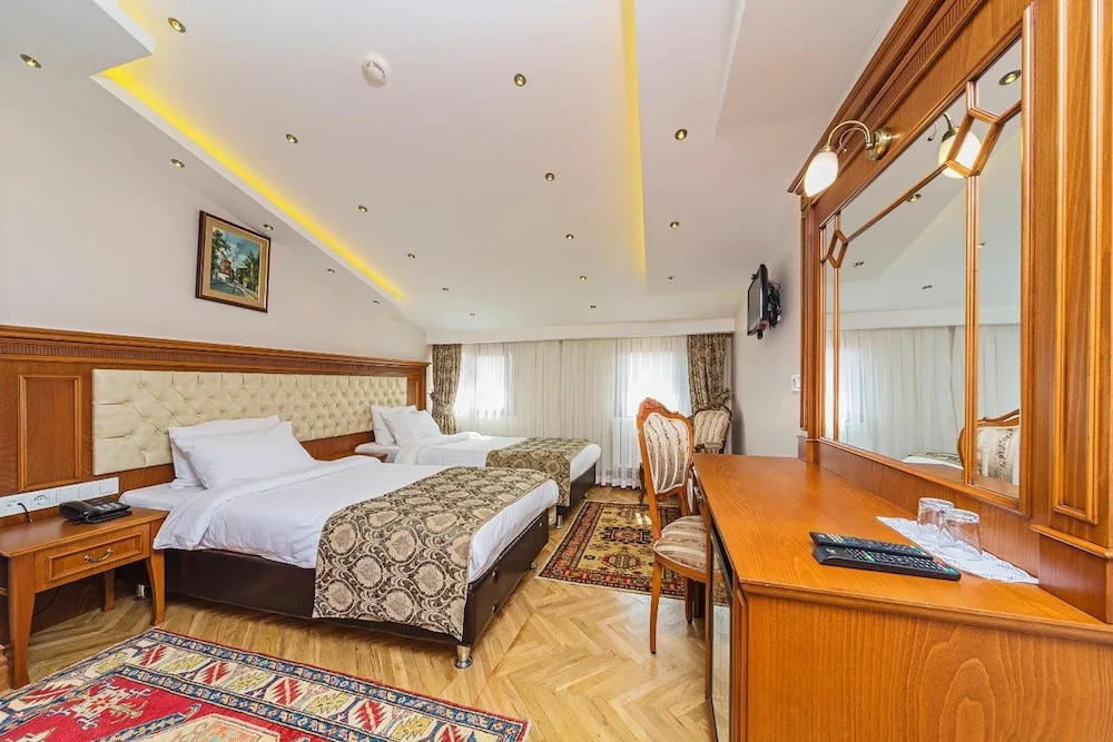 Spectra Hotel - Chambres