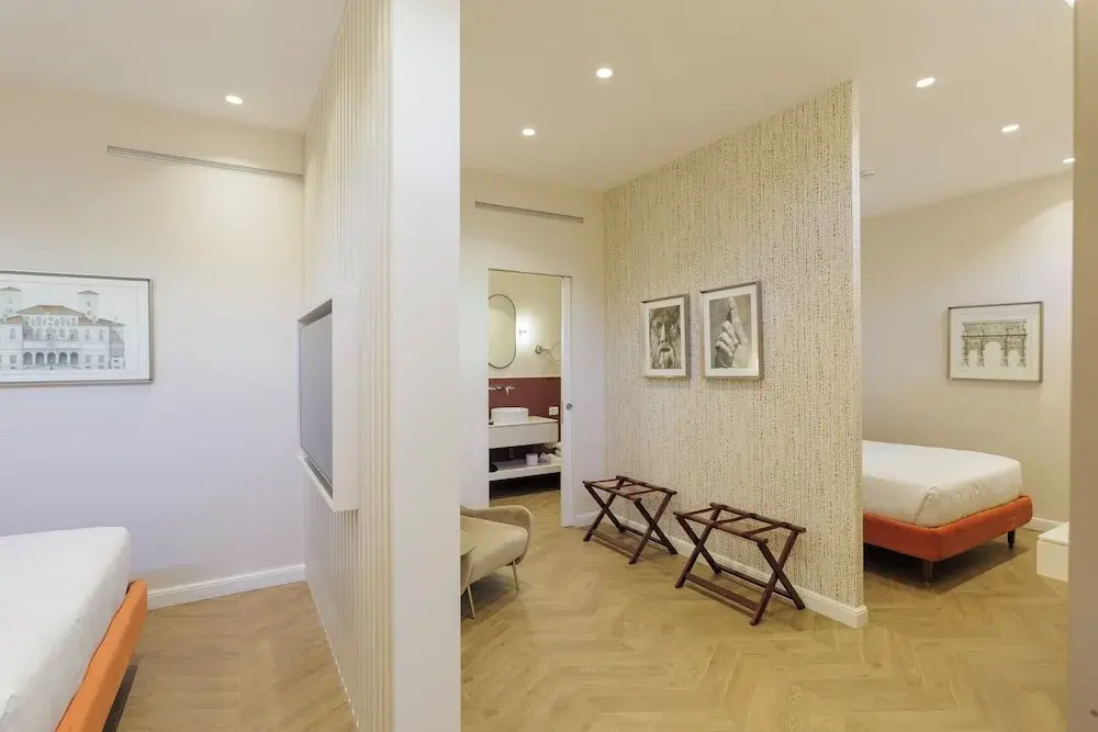Четырёхместный номер Deluxe в Sentho Roma