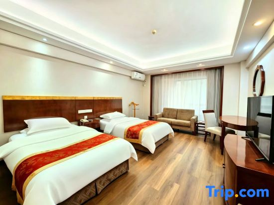 Xinxiang Hotel - Chambres