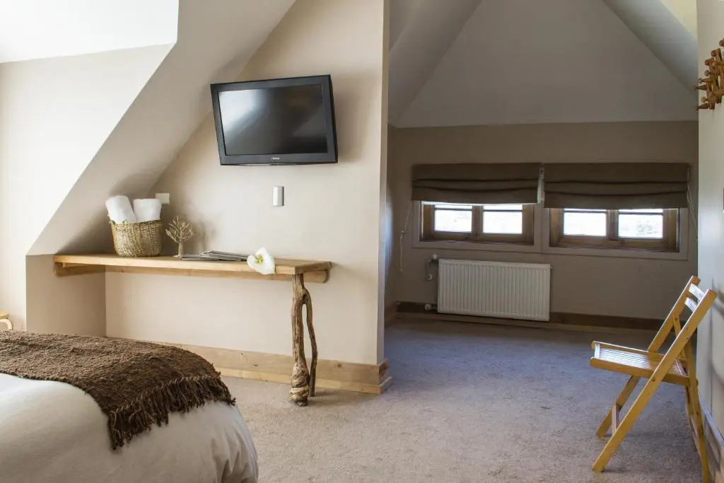 Hotel Boutique Casa Kalfu - Chambres