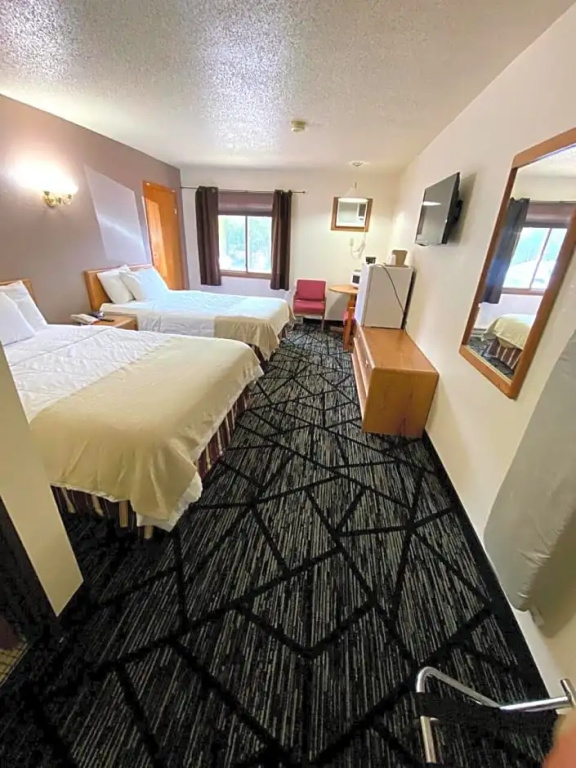 Woodlands Inn & Suites - Chambres