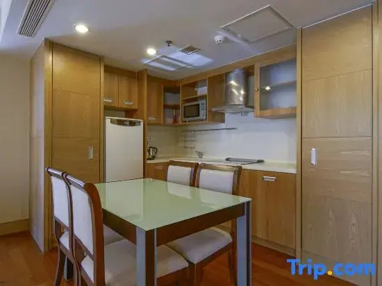 Jingguang Center Apartment Hotel - Chambres