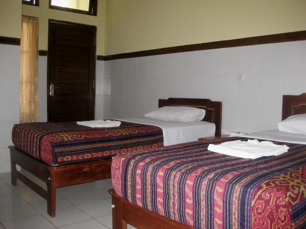 Sayang Maha Mertha Hotel - Chambres