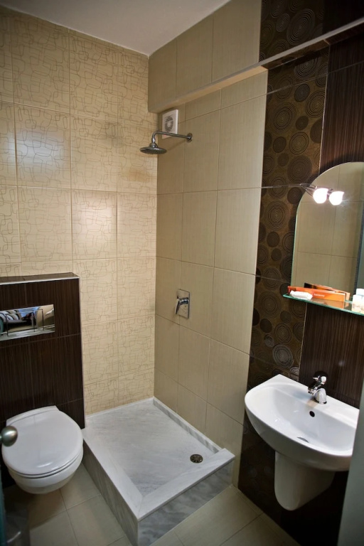 RG Status Hotel - Chambres