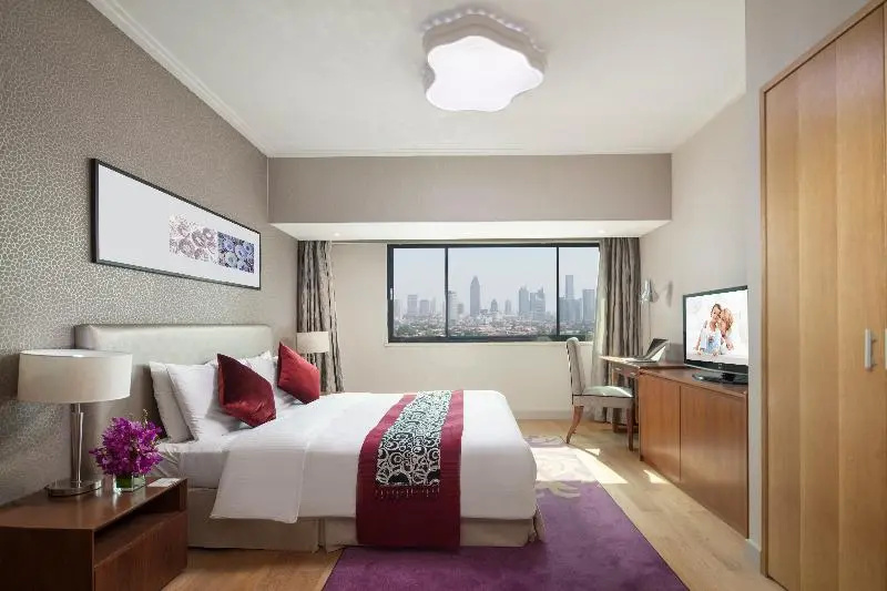 Somerset Olympic Tower Tianjin - Chambres