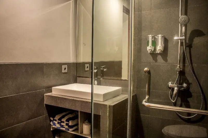Kamini Legian Hotel - Chambres