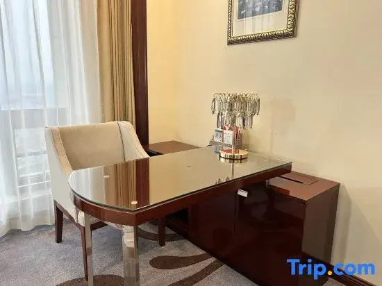 Baiyunbian Hotel - Chambres