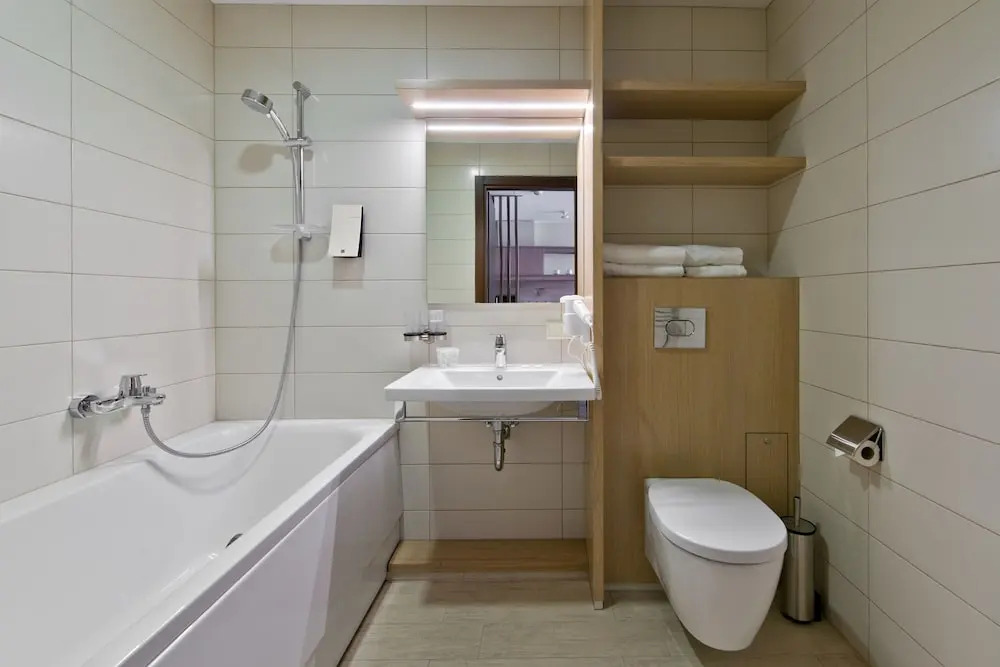 Трёхместные апартаменты Deluxe в Апарт-отель Amberton Green Паланга