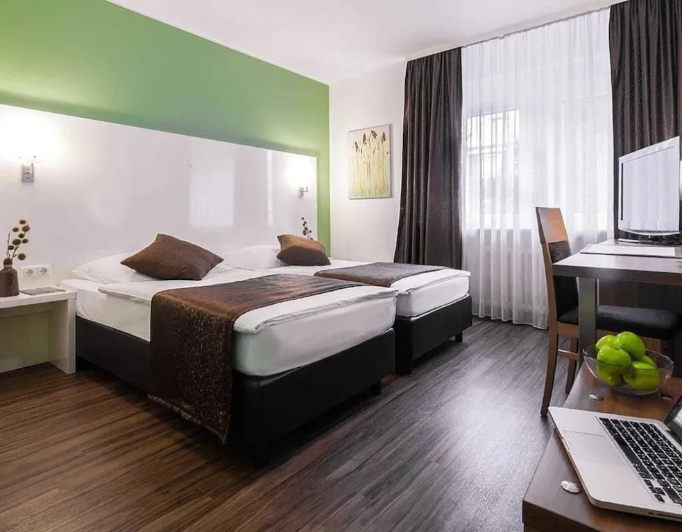 Hotel Mondial - Chambres