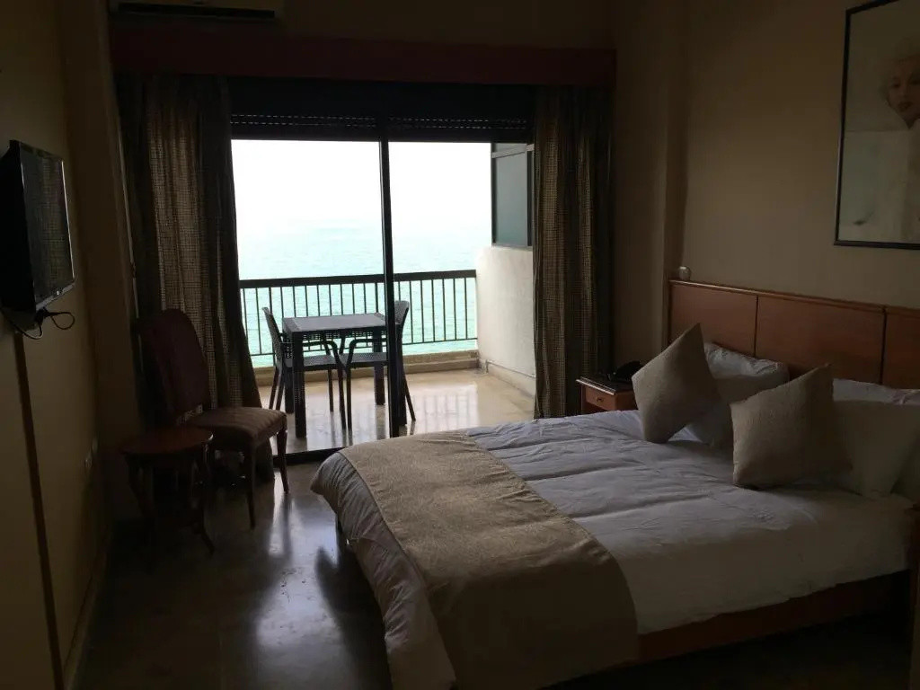 Holiday Suites Hotel And Beach - Chambres