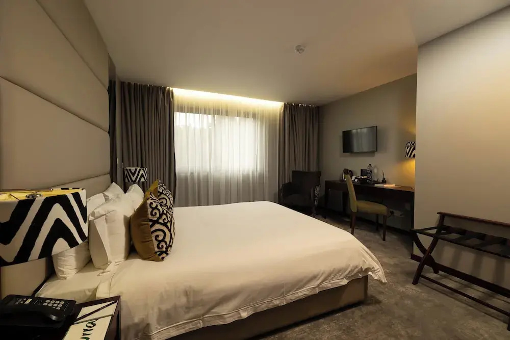 Fiesta Residences Boutique Hotel and Serviced Apartments - Chambres